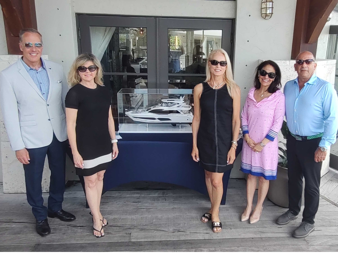 Exclusive Yachts Executive Team at Hamilton Harbor Yacht Club<br />
Photo of Exclusive Yachts Executive Team, CEO Scott Stuckmann, CMO Julie Perry, Head of Sales Lou Clark, and Co-Founders Jacquie and Bill Charbonneau, also have Naples Nantucket Yacht Charter Group. Photo taken at the March 27 private launch party for Exclusive Yachts at the Hamilton Harbor Yacht Club in Naples Florida.